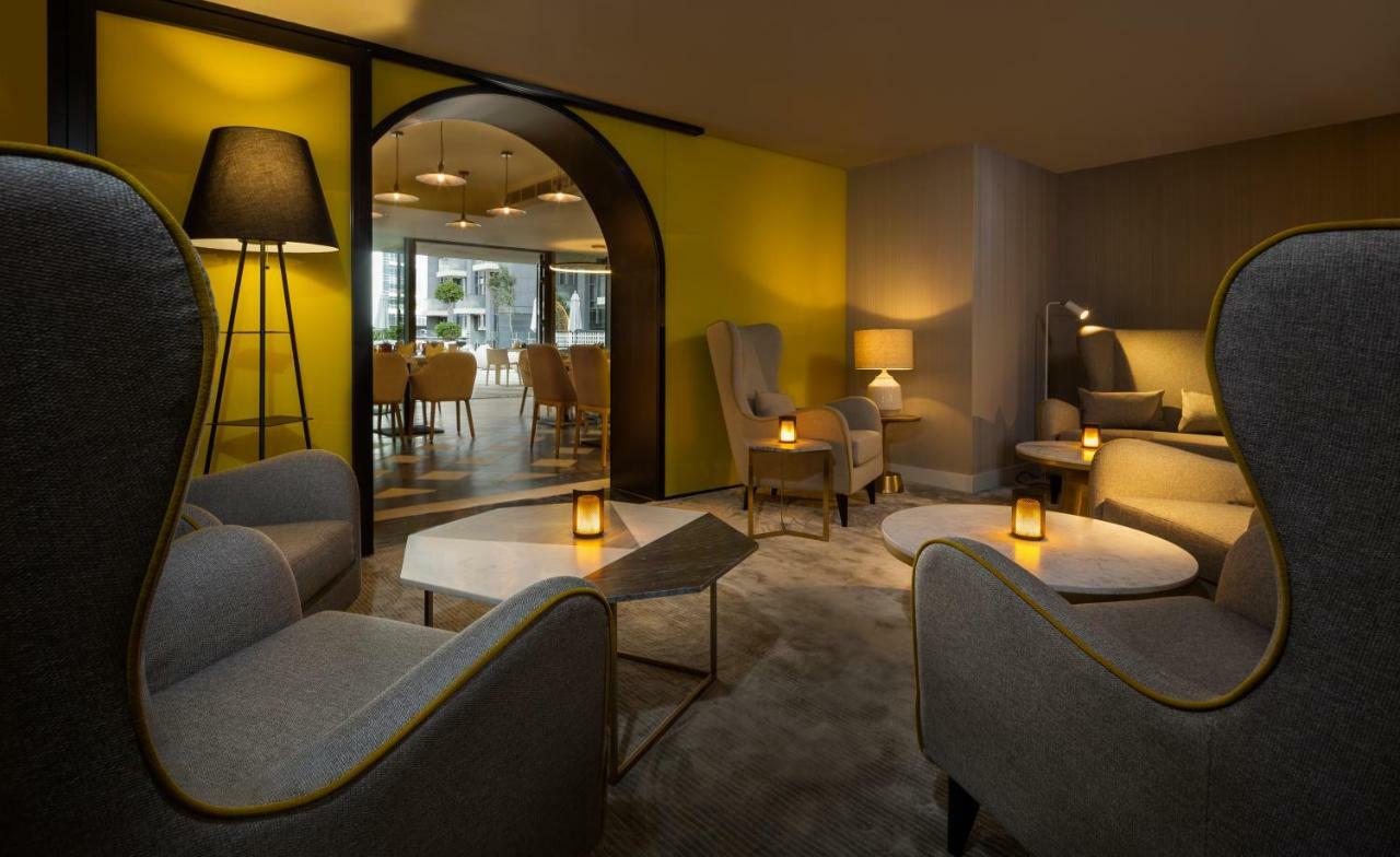 두바이 밀레니엄 아트리아 비즈니스 베이 아파트 호텔 외부 사진 The lounge at the hotel